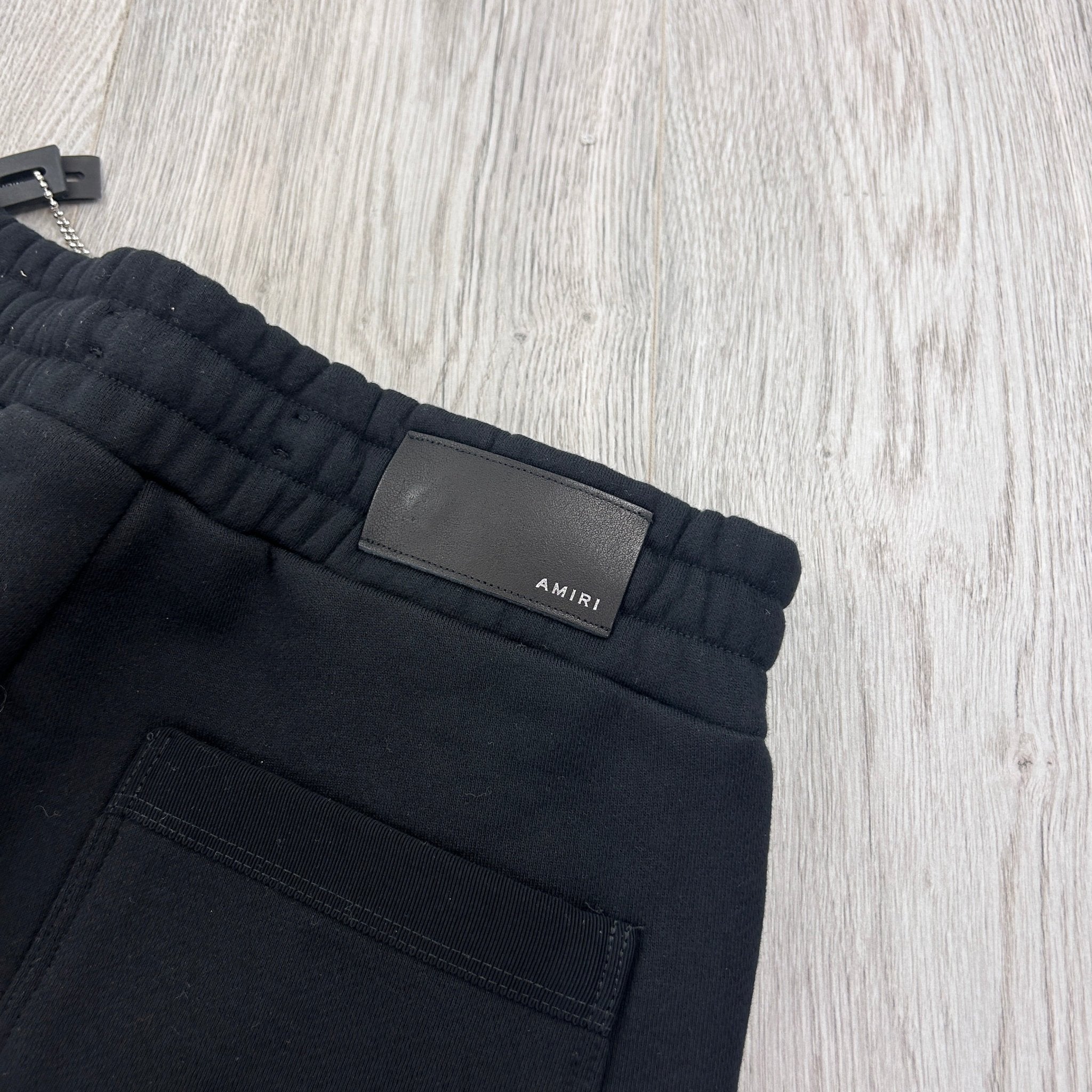 Amiri Men’s Black Cotten Logo Printed Drawstring Shorts - Morely TrendsAmiri Type here:)