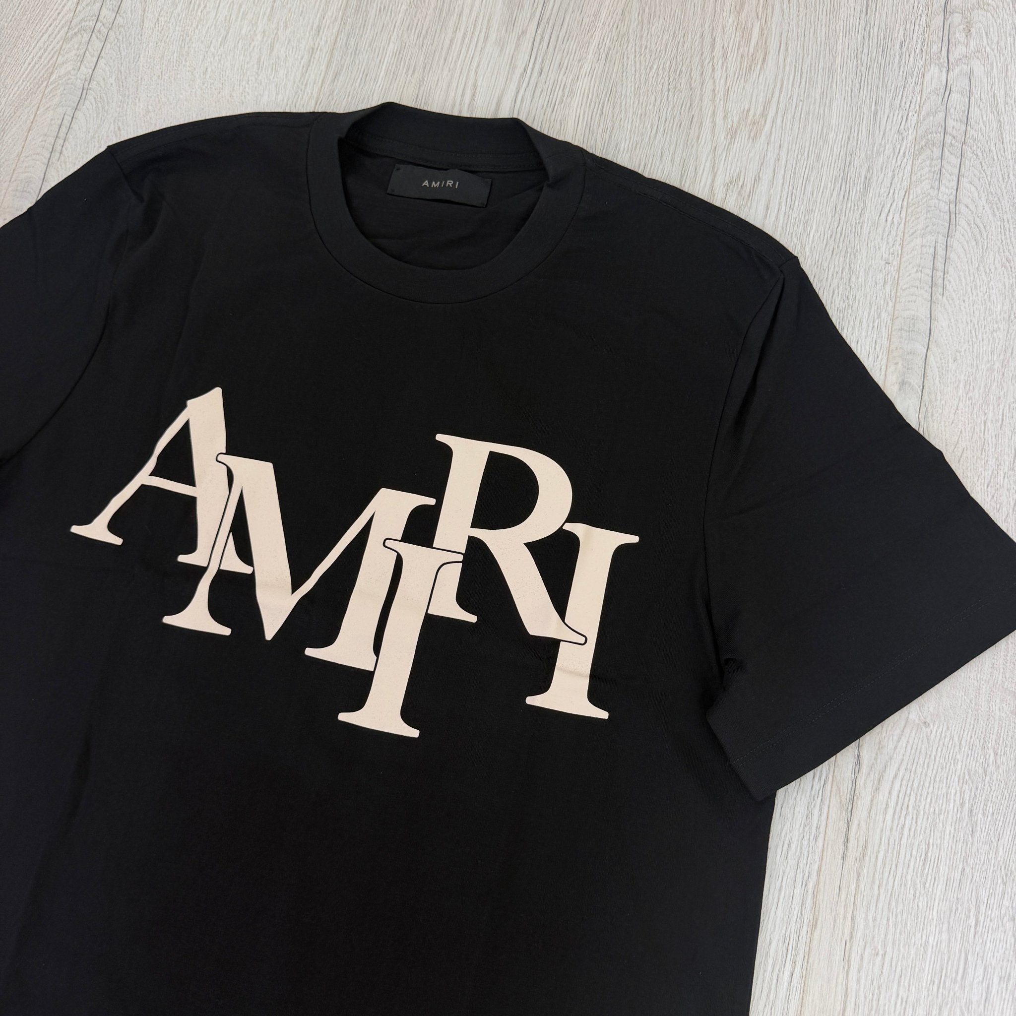 Amiri Men’s Black T-shirt With White Logo - Morely TrendsAmiri Type here:)