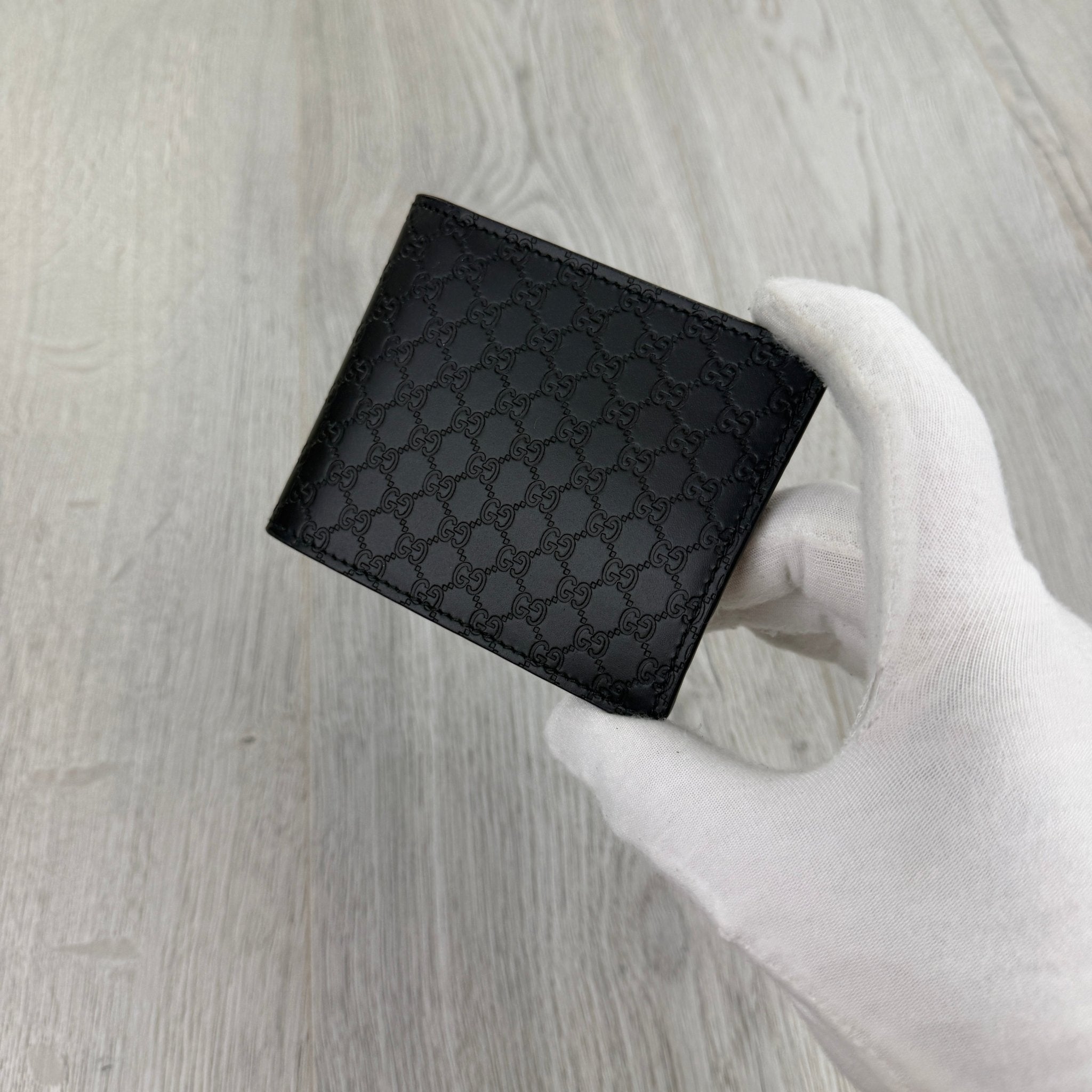 Gucci Men’s GG Leather Monogram Wallet - Morely TrendsGucci Type here:)
