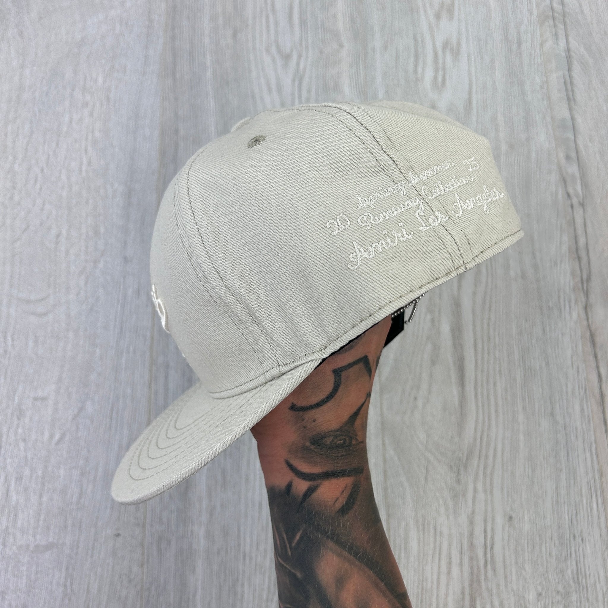 Amiri Men’s 22 Fitted Flat Beige Cap - Morely TrendsAmiri Type here:)