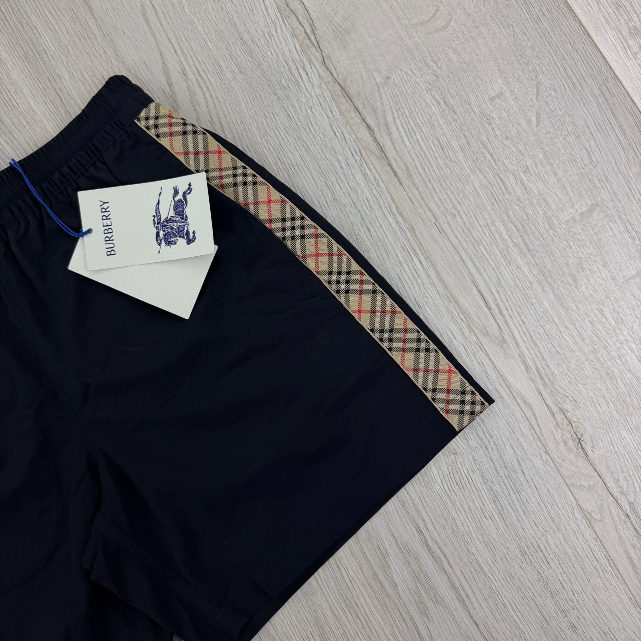 Burberry Men’s Navy Swim Shorts - Morely TrendsBurberry Type here:)