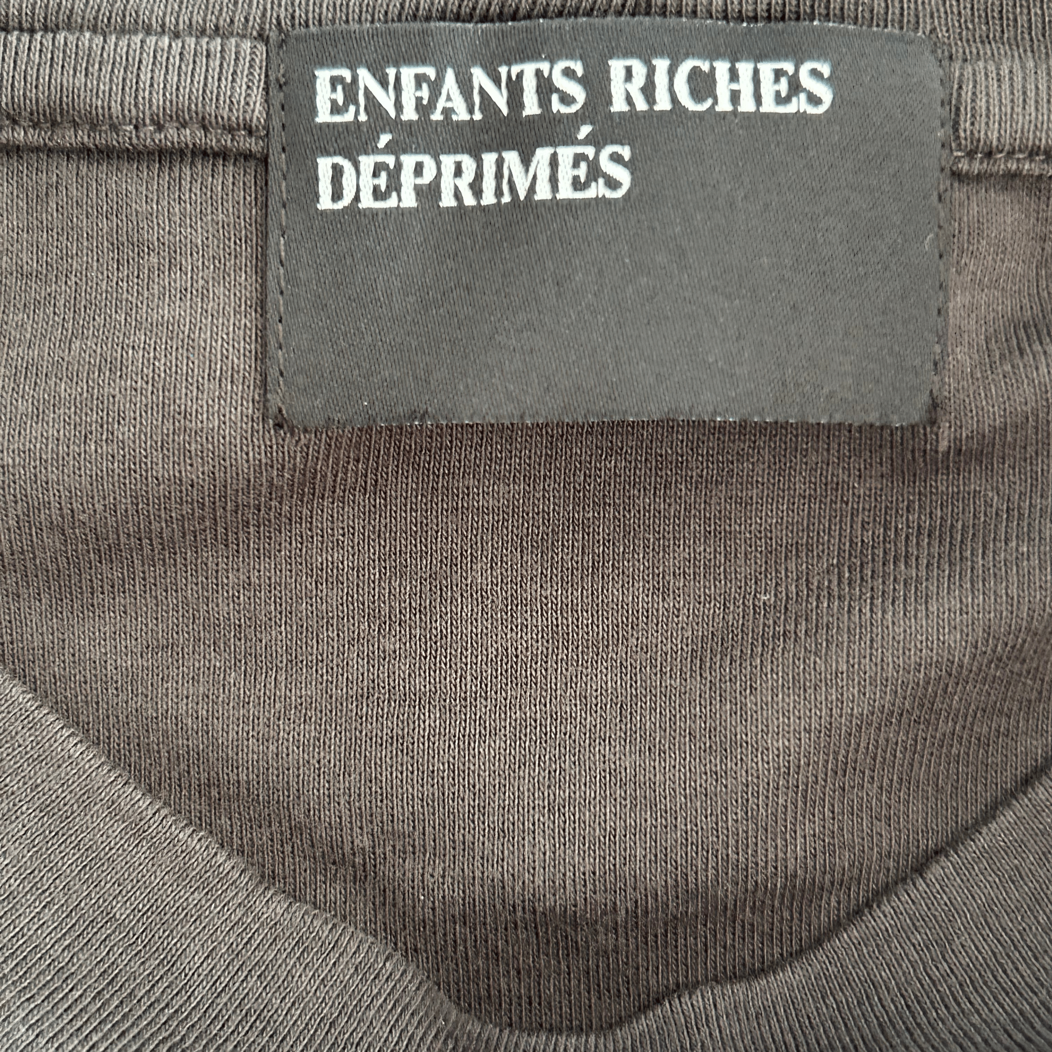 Enfants Riches Deprimes Faded Black & White Women In Sheet Graphic T-Shirt - Morely TrendsEnfants Riches Deprimes Type here:)