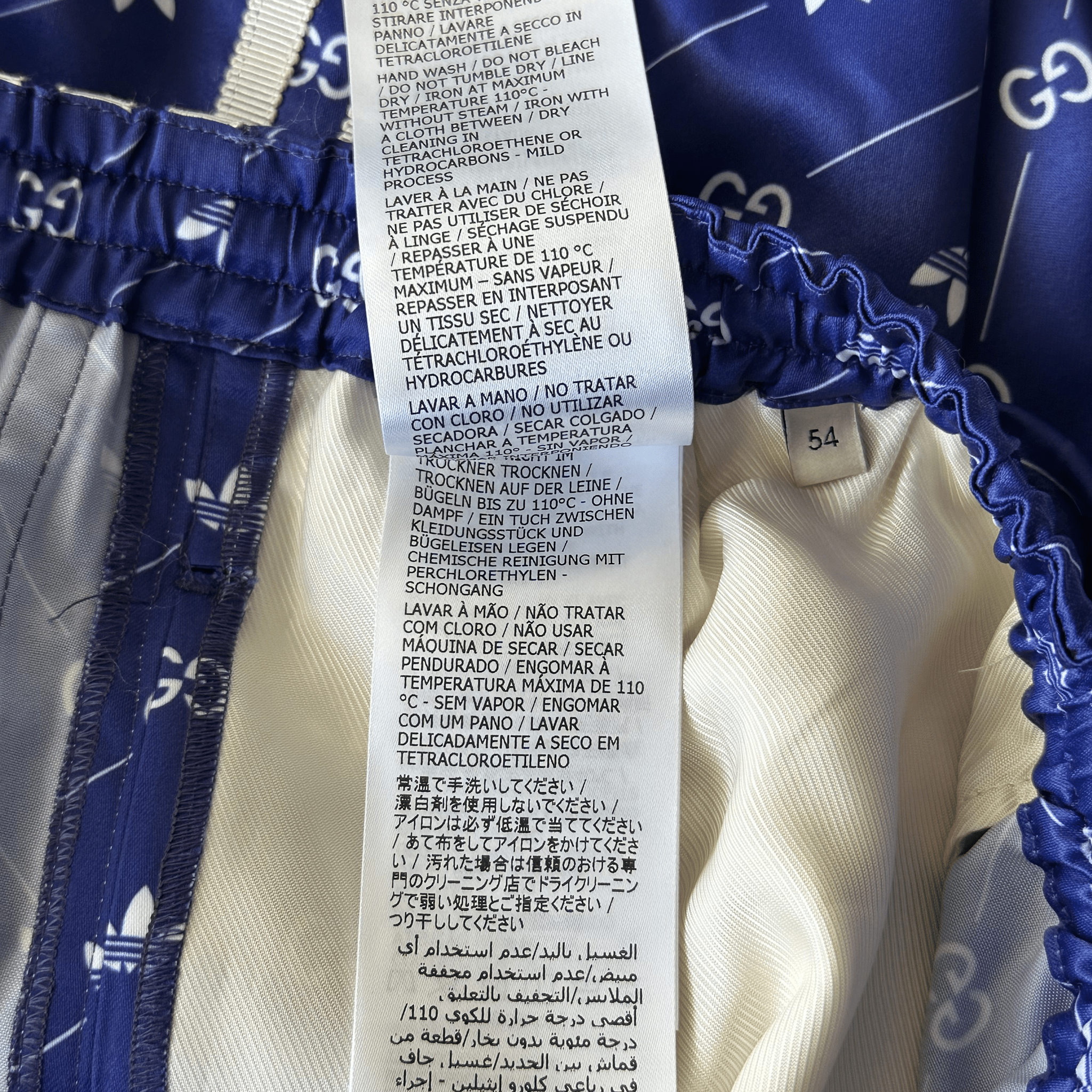 Gucci Adidas Blue & White Monogram Track Shorts - Morely TrendsGucci Type here:)