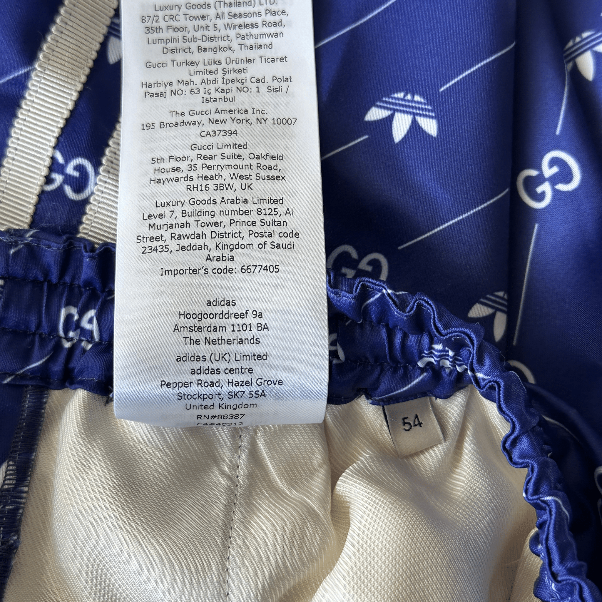 Gucci Adidas Blue & White Monogram Track Shorts - Morely TrendsGucci Type here:)