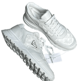 Prada Leather and Re-Nylon high-top sneakers