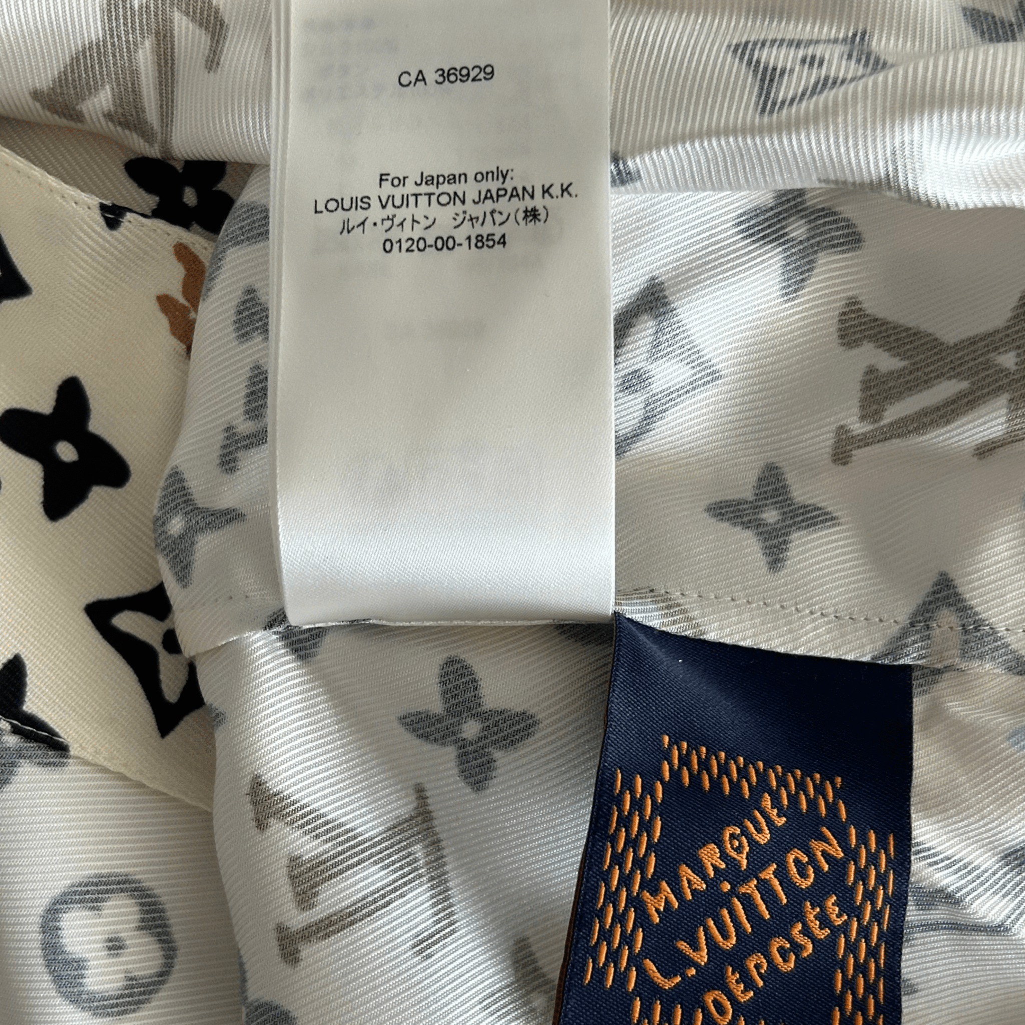 Louis Vuitton Tyler Cream Multicolor Monogram Silk Button Up Shirt - Morely TrendsLouis Vuitton Type here:)