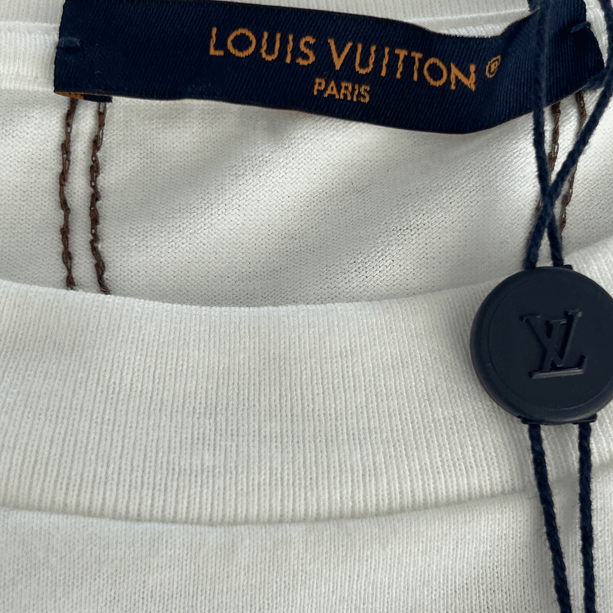 Louis Vuitton White & Brown Embroidered Graphic T-Shirt - Morely TrendsLouis Vuitton Type here:)