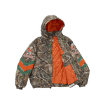 Supreme Mitchell & Ness NCAA Hooded Stadium Jacket Woodland Camo