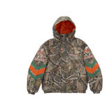 Supreme Mitchell & Ness NCAA Hooded Stadium Jacket Woodland Camo