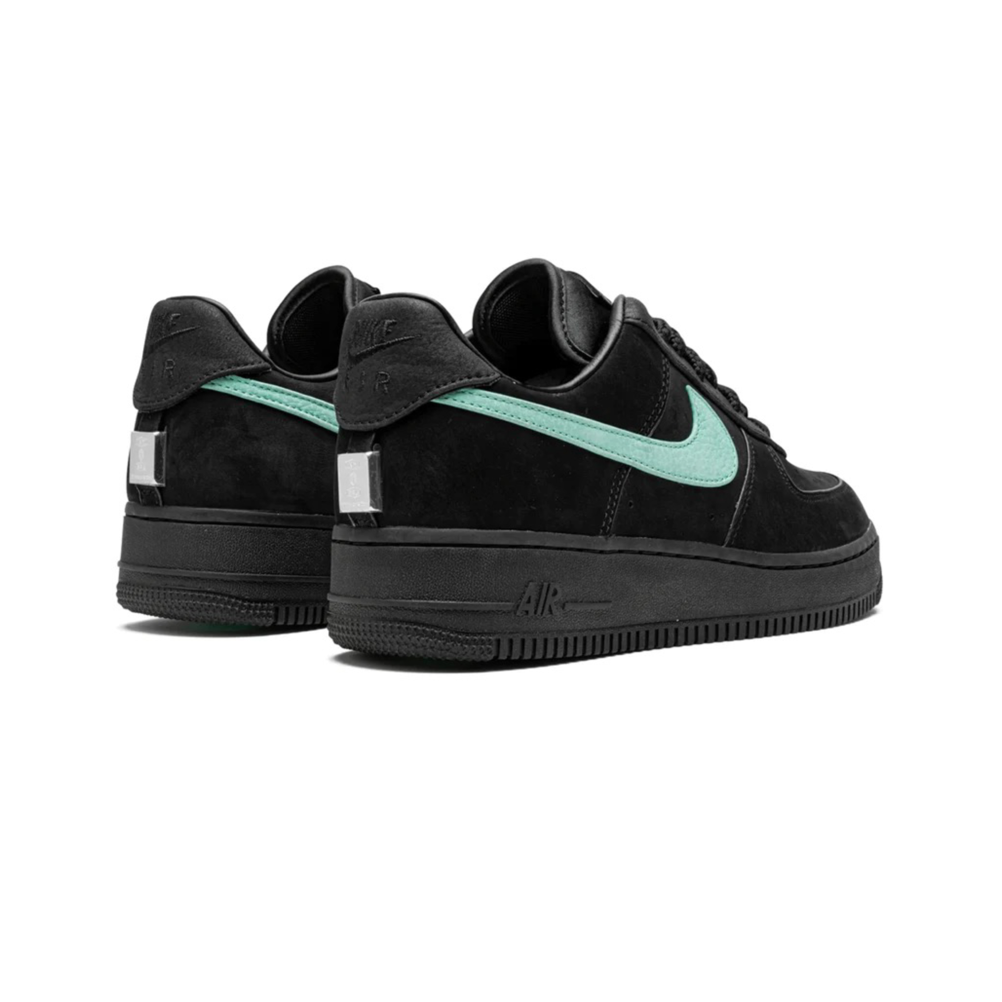 Black nikes 2024 with teal swoosh